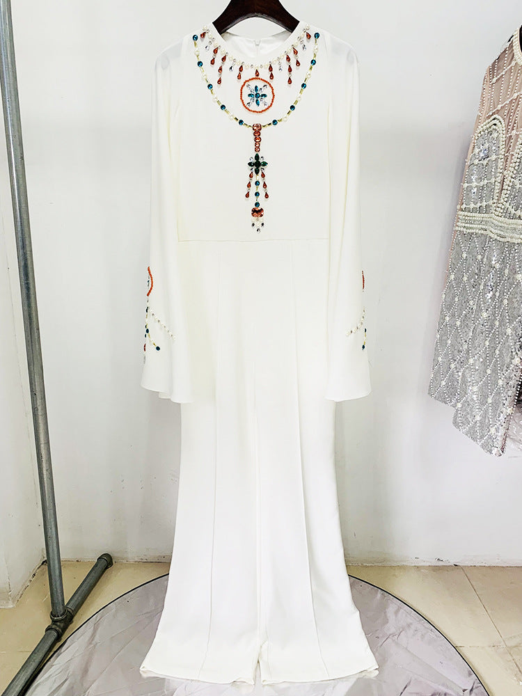 Embellished Ivory Cape Jumpsuit | Elegant White Wide-Leg Jumpsuit with Jewel Appliqué and Long Sleeves MYLINE